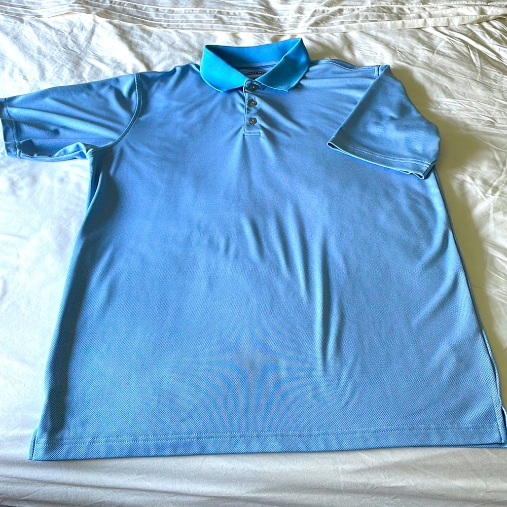 Mens 100% polyester short sleeve golf shirt.